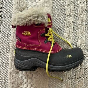 Girls sized 1 north face winter boots with fur top. Used for one winter season